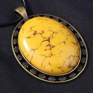 Yellow Oval Pendant Necklace.  (A)